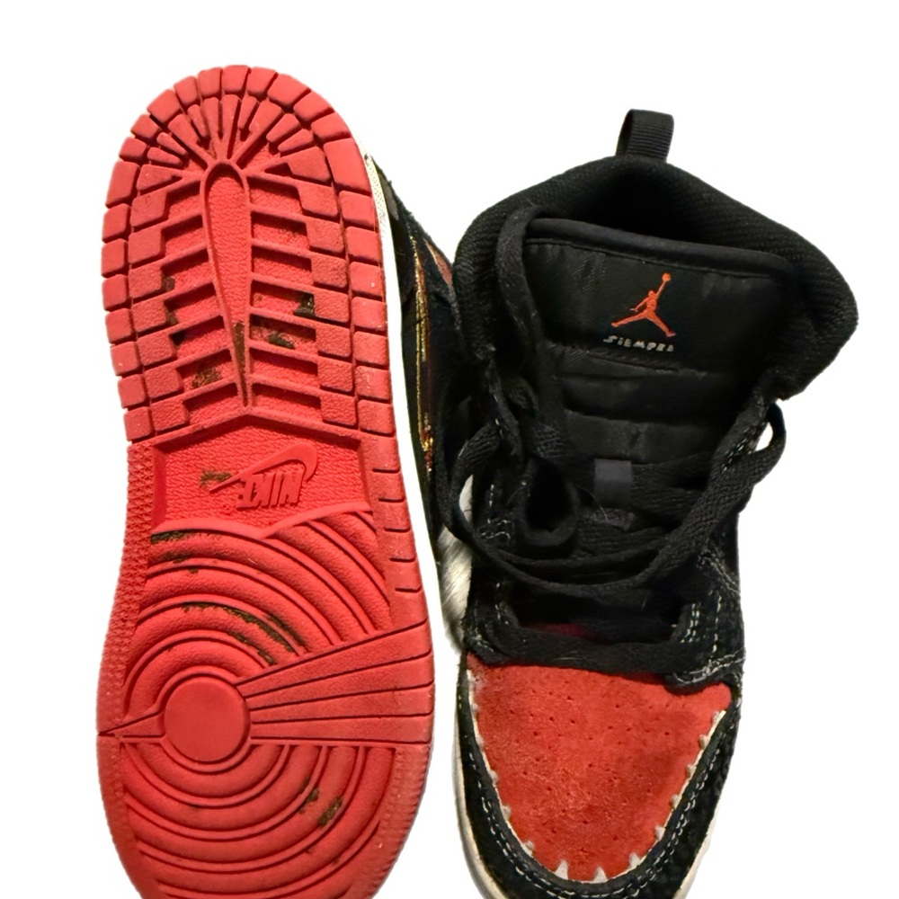 Nike Black and Red Sneakers with High-Top Design and Durable Rubber Sole